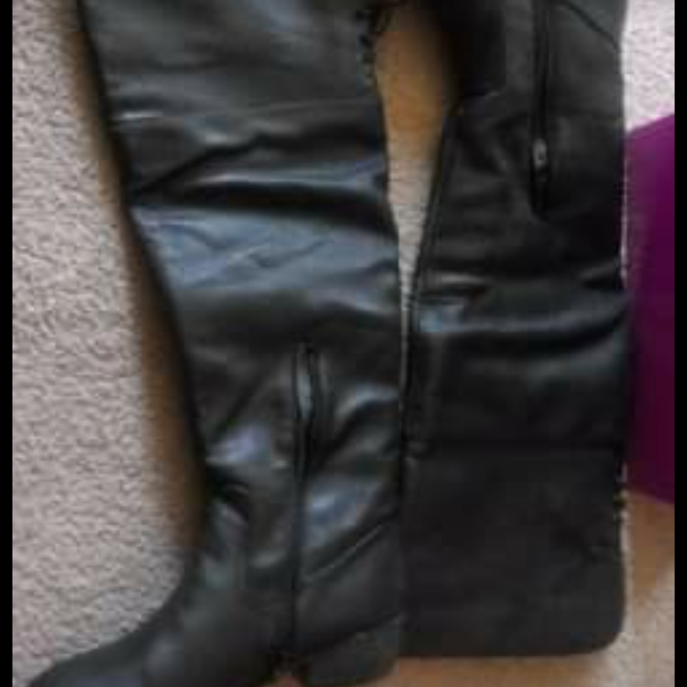 Tall black boots